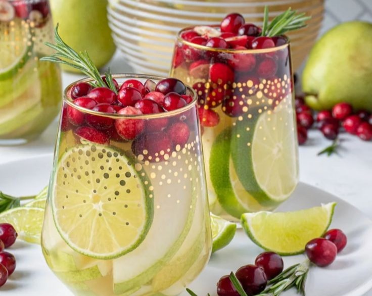 Festive Cranberry Rosemary White Christmas Sangria with Cinnamon Syrup top view
