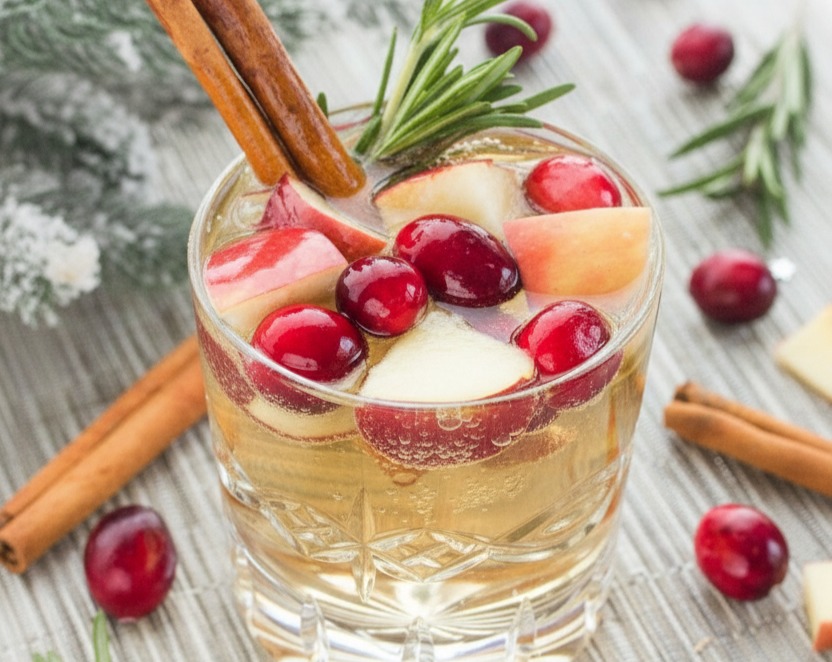 Festive Cranberry Rosemary White Christmas Sangria with Cinnamon Syrup suggested serving
